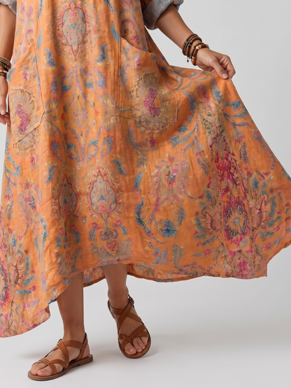 Antonella | Abito midi oversize stampato con tasche e collo a intaglio
