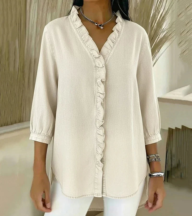 Clemencia — Blusa fluida con scollo a V e volant