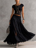 Lucía - Top in pizzo nero gonna plissettata