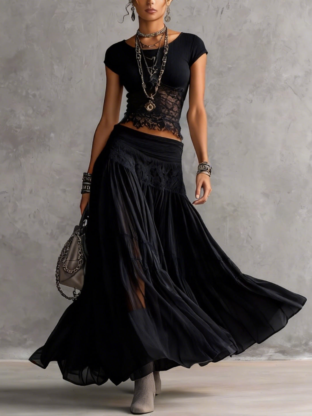 Lucía - Top in pizzo nero gonna plissettata