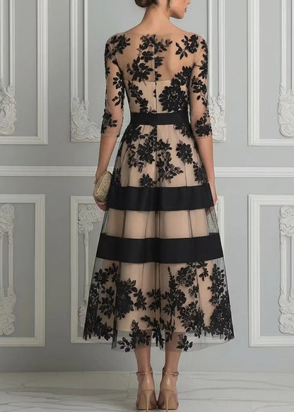 Claudia - Elegante abito in pizzo floreale
